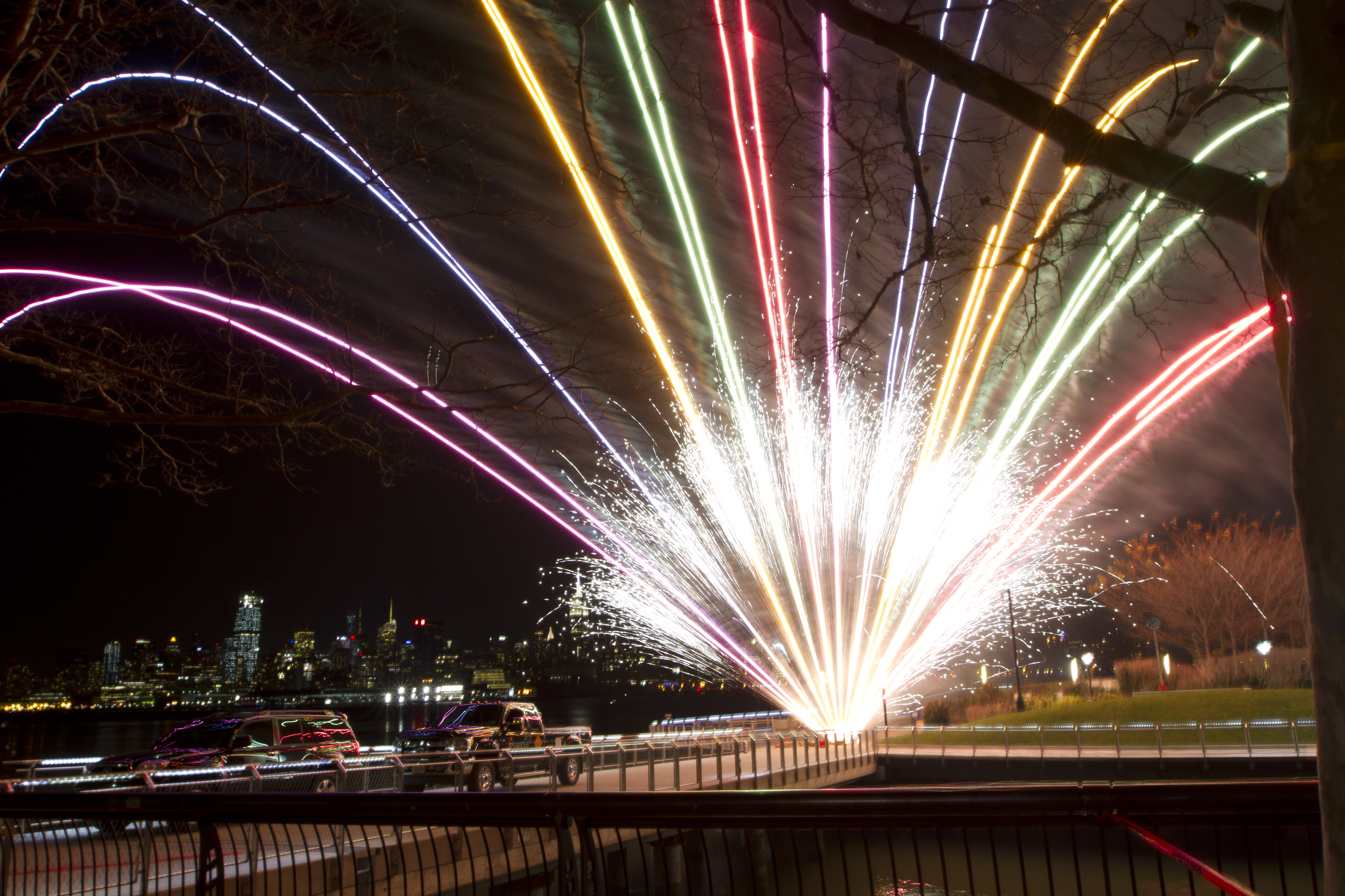 A beautiful rainbow fan cake ignited during a NJ fireworks show that was set up by a fireworks company.