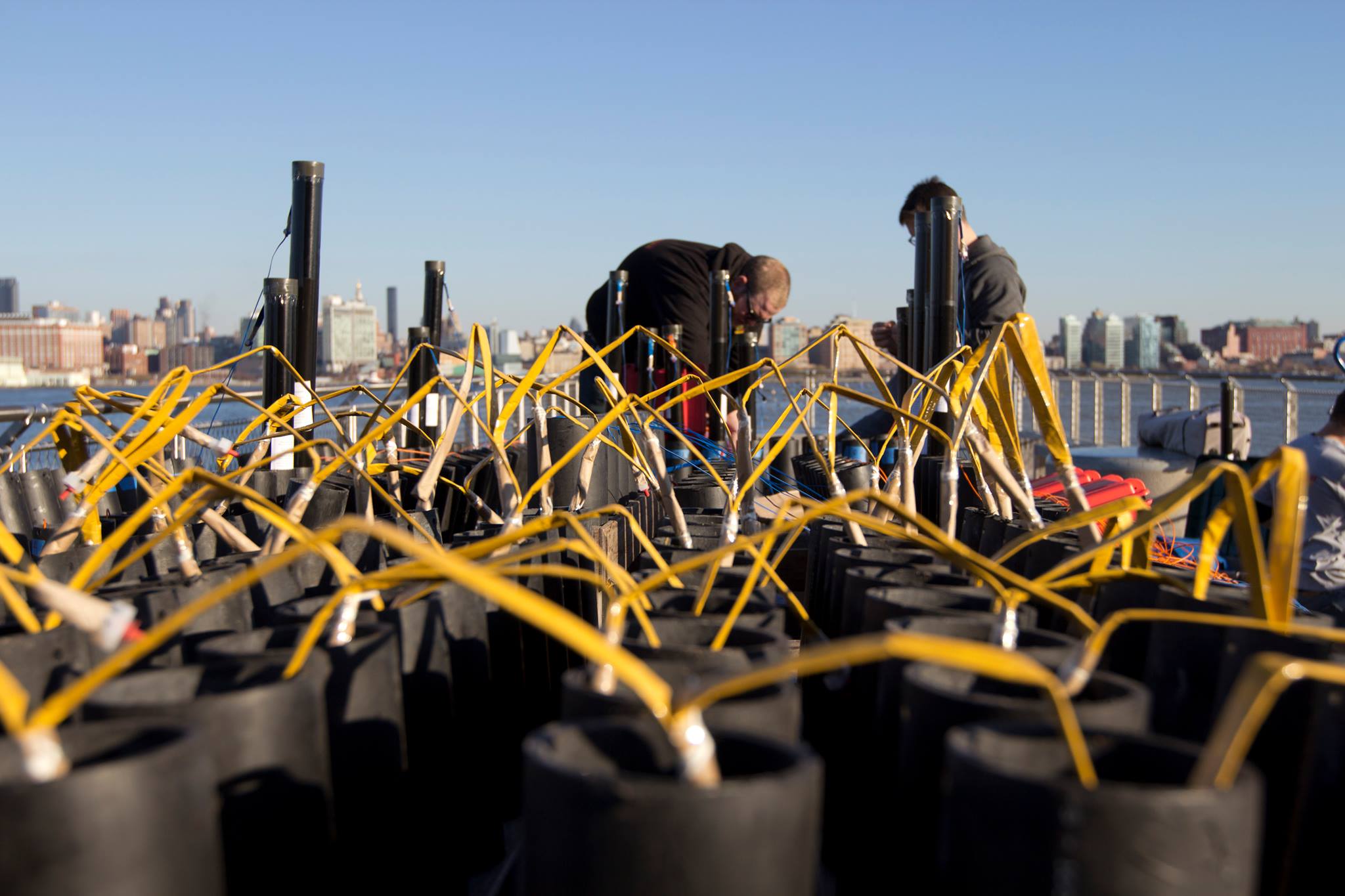 The crew of a New Jersey fireworks company sets up for a PA wedding fireworks show.